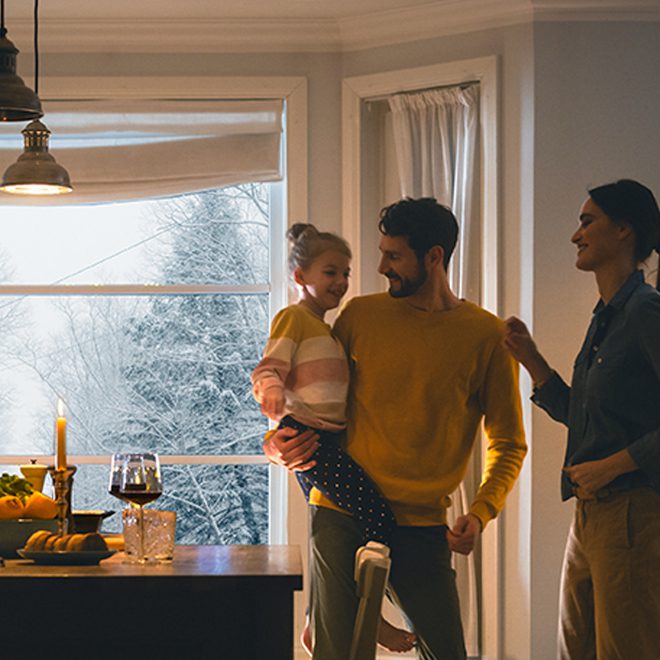 Family in a heated home during the winter with power